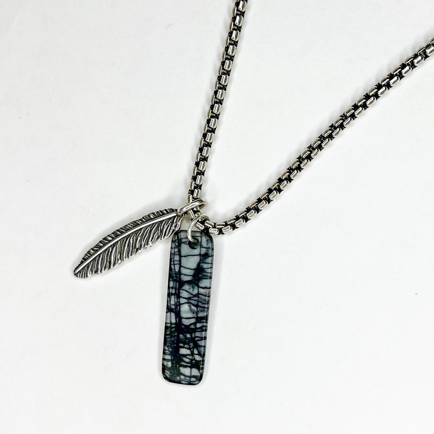 We Gallery silver feather