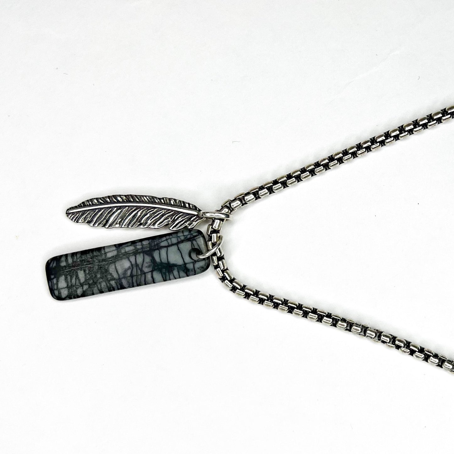 We Gallery silver feather